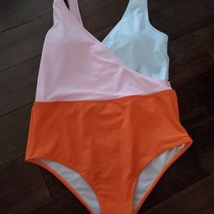 One piece swimming suit in pink white and Orange Size large New